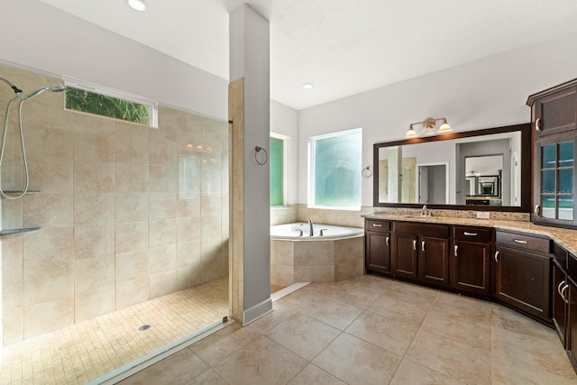 1304 Lorea Ln, Brandon, FL 33511 - bathroom featuring a bath, vanity, a tile shower, and tile patterned floors