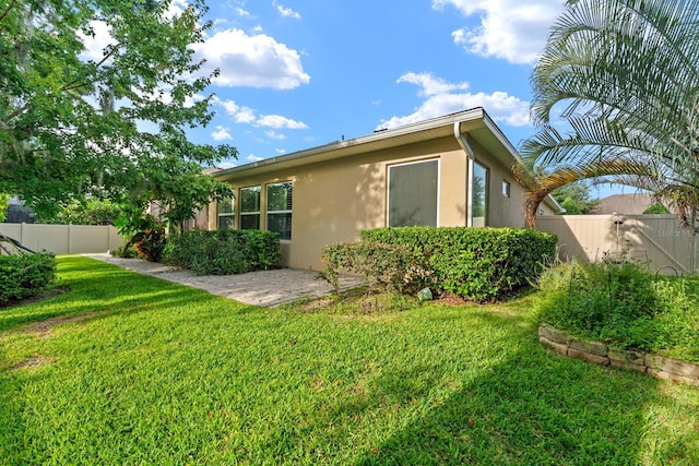 1304 Lorea Ln, Brandon, FL 33511 - view of property exterior featuring stucco siding