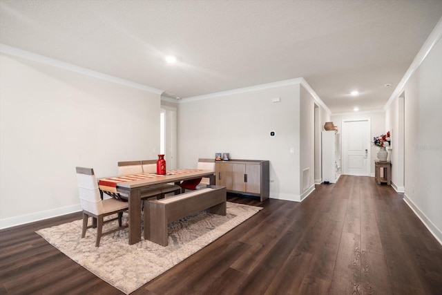 2516 Cobalt Shores Ln, Clearwater, FL 33761 - dining room with dark wood-style flooring, crown molding, and recessed lighting
