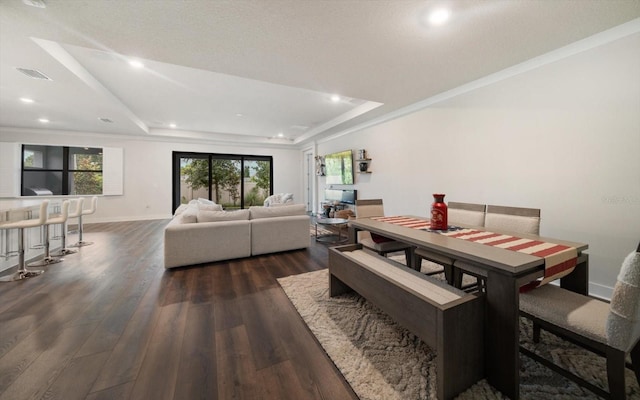 2516 Cobalt Shores Ln, Clearwater, FL 33761 - dining room featuring a raised ceiling, dark wood finished floors, and recessed lighting