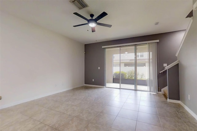 10409 Orchid Mist Ct, Riverview, FL 33578 - empty room featuring stairs, ceiling fan, and light tile patterned floors
