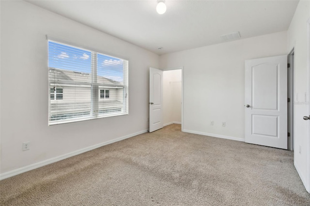 10409 Orchid Mist Ct, Riverview, FL 33578 - unfurnished bedroom with carpet floors and a walk in closet