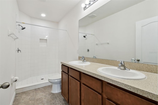 10409 Orchid Mist Ct, Riverview, FL 33578 - bathroom with double vanity, tiled shower, and tile patterned flooring