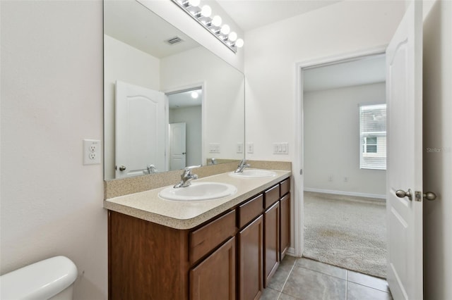 10409 Orchid Mist Ct, Riverview, FL 33578 - bathroom featuring double vanity and tile patterned flooring