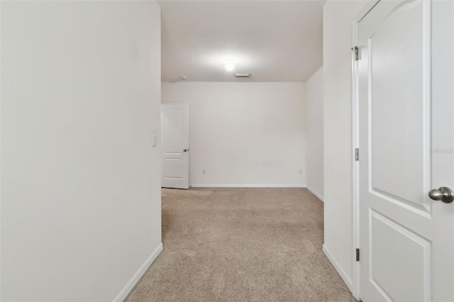 10409 Orchid Mist Ct, Riverview, FL 33578 - hallway with light colored carpet and baseboards