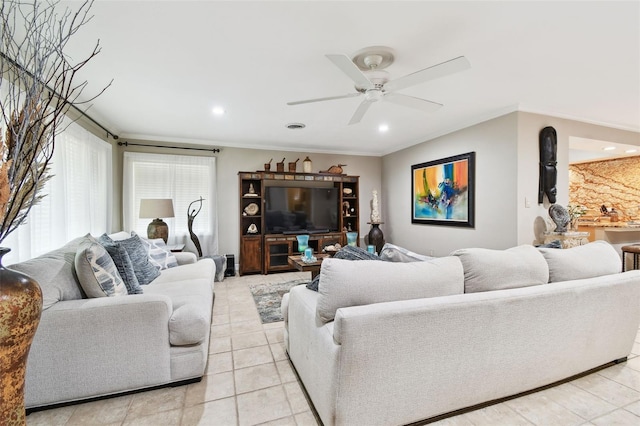 1020 Charles St, Clearwater, FL 33755 - living room featuring a ceiling fan, ornamental molding, recessed lighting, and light tile patterned flooring