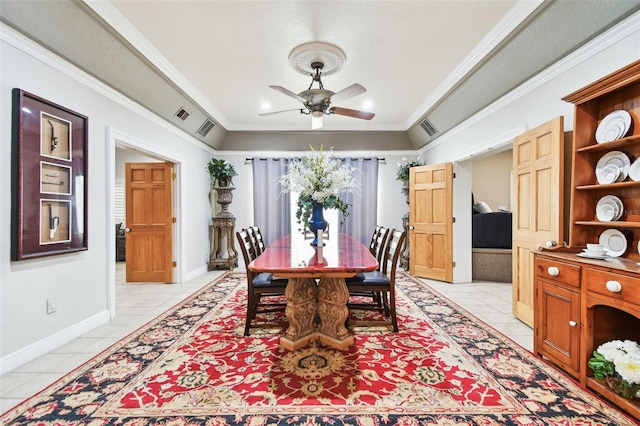 1020 Charles St, Clearwater, FL 33755 - dining room featuring ceiling fan, light tile patterned floors, and ornamental molding