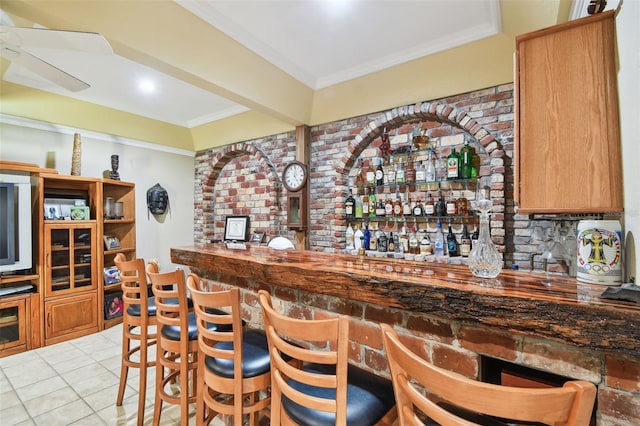 1020 Charles St, Clearwater, FL 33755 - indoor dry bar with crown molding and tile patterned floors
