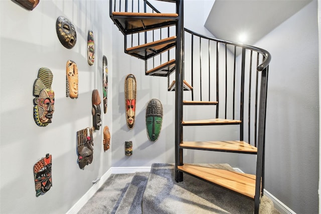 1020 Charles St, Clearwater, FL 33755 - staircase with carpet floors and baseboards