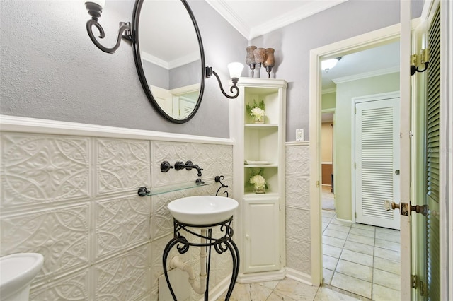 1020 Charles St, Clearwater, FL 33755 - bathroom with ornamental molding and wainscoting