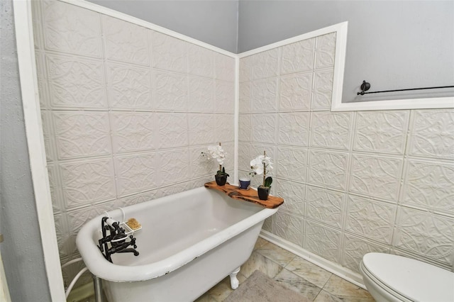 1020 Charles St, Clearwater, FL 33755 - bathroom with a freestanding bath and toilet