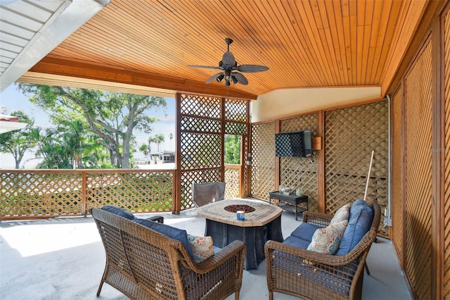 1020 Charles St, Clearwater, FL 33755 - view of patio with ceiling fan and an outdoor living space with a fire pit