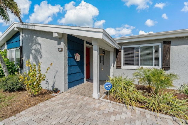 3823 Sail Dr, New Port Richey, FL 34652 - entrance to property with stucco siding
