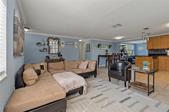 3823 Sail Dr, New Port Richey, FL 34652 - living area with light tile patterned flooring and ornamental molding