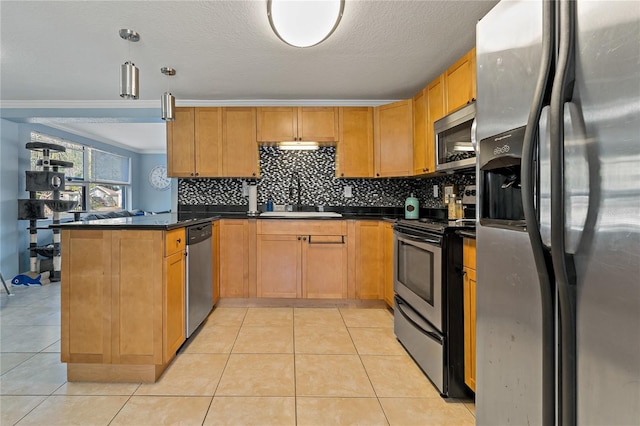 3823 Sail Dr, New Port Richey, FL 34652 - kitchen featuring stainless steel appliances, a peninsula, dark countertops, tasteful backsplash, and light tile patterned floors