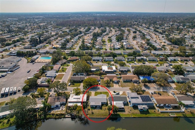 3823 Sail Dr, New Port Richey, FL 34652 - aerial view of property and surrounding area featuring a large body of water and nearby suburban area