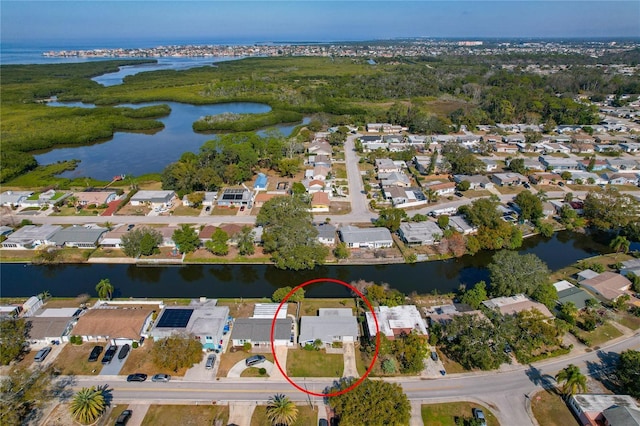 3823 Sail Dr, New Port Richey, FL 34652 - aerial overview of property's location featuring a large body of water and nearby suburban area