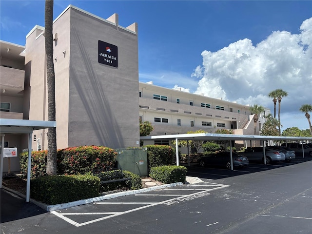 7401 Bay Island Dr S Unit 338, South Pasadena, FL 33707 - view of building exterior with covered parking