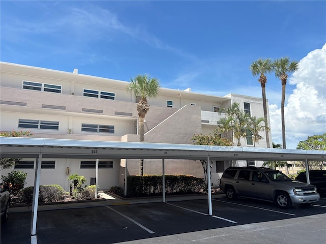 7401 Bay Island Dr S Unit 338, South Pasadena, FL 33707 - view of building exterior featuring covered parking