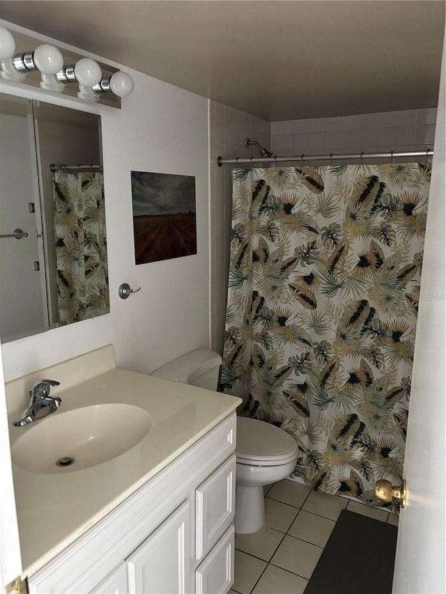 7401 Bay Island Dr S Unit 338, South Pasadena, FL 33707 - bathroom featuring tile patterned flooring, vanity, and a shower with curtain