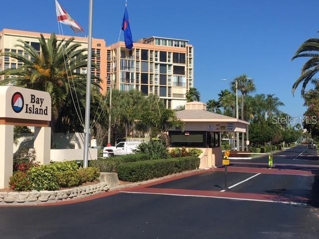 7401 Bay Island Dr S Unit 338, South Pasadena, FL 33707 - view of building exterior featuring uncovered parking
