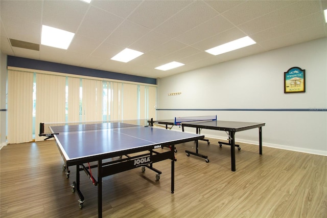 7401 Bay Island Dr S Unit 338, South Pasadena, FL 33707 - recreation room with a paneled ceiling and wood finished floors