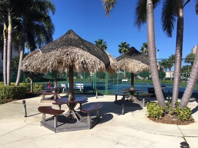 7401 Bay Island Dr S Unit 338, South Pasadena, FL 33707 - view of property's community featuring a tennis court