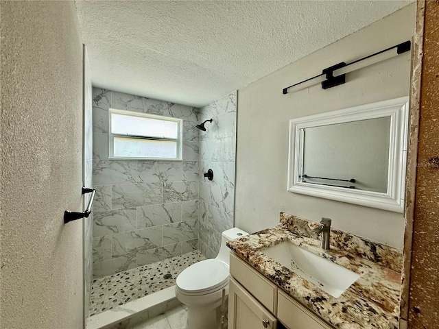 7400 Mako Dr, Hudson, FL 34667 - full bath with a shower stall, vanity, and a textured ceiling
