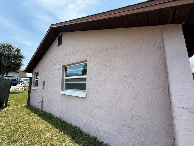 7400 Mako Dr, Hudson, FL 34667 - view of property exterior featuring stucco siding