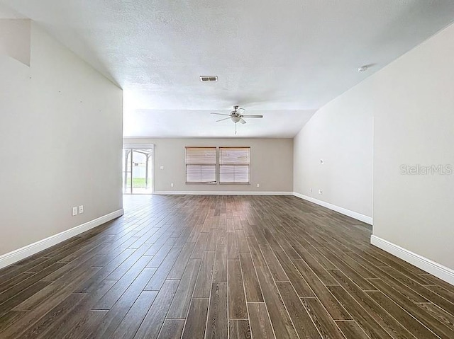 2049 Darlington Oak Dr, Seffner, FL 33584 - unfurnished living room featuring dark wood-style floors, ceiling fan, and lofted ceiling