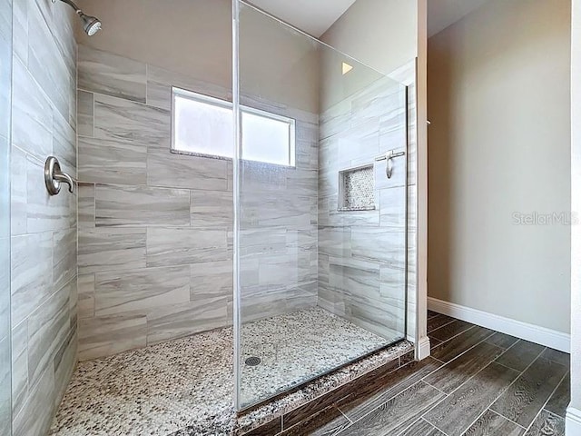 2049 Darlington Oak Dr, Seffner, FL 33584 - bathroom featuring a shower stall and wood finished floors