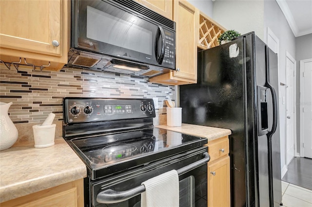 5000 Culbreath Key Way Unit 8-106, Tampa, FL 33611 - kitchen with black appliances, crown molding, light countertops, and tasteful backsplash