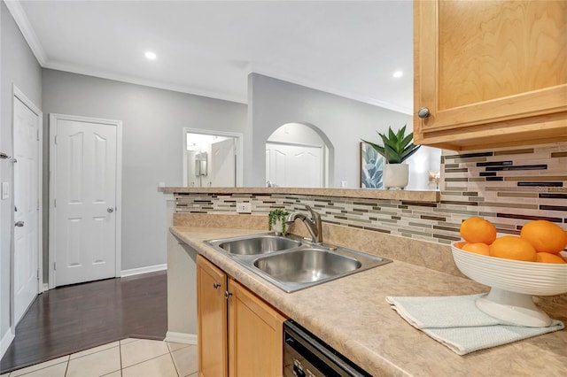 5000 Culbreath Key Way Unit 8-106, Tampa, FL 33611 - kitchen with decorative backsplash, ornamental molding, light countertops, recessed lighting, and light brown cabinets