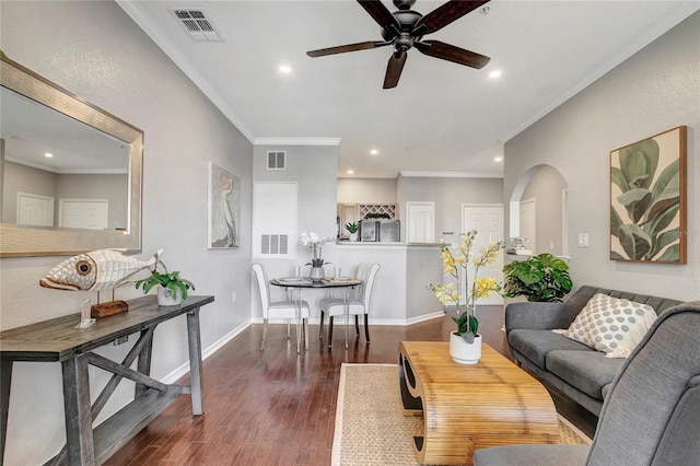 5000 Culbreath Key Way Unit 8-106, Tampa, FL 33611 - living room featuring a ceiling fan, wood finished floors, recessed lighting, crown molding, and arched walkways