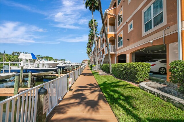 5000 Culbreath Key Way Unit 8-106, Tampa, FL 33611 - view of home's community featuring a dock, boat lift, and a water view