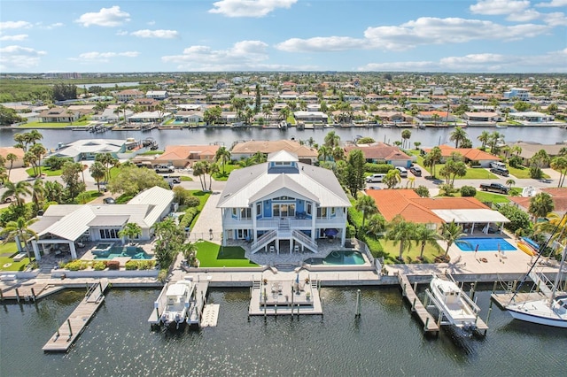 5521 Windward Way, New Port Richey, FL 34652 - aerial perspective of suburban area with a large body of water
