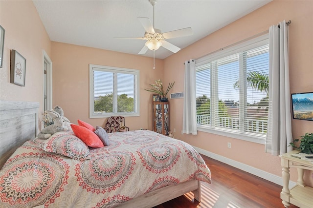 5521 Windward Way, New Port Richey, FL 34652 - bedroom with wood finished floors and a ceiling fan