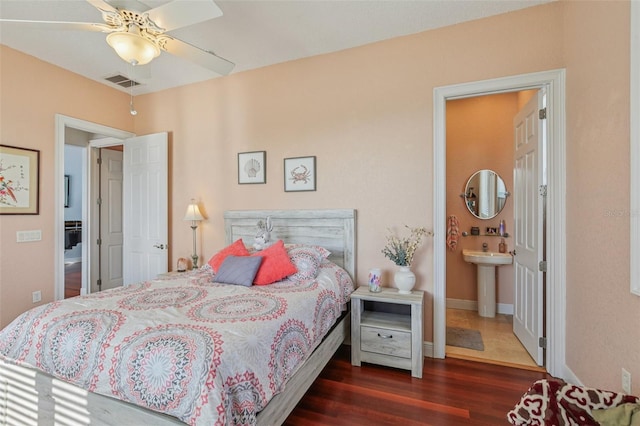 5521 Windward Way, New Port Richey, FL 34652 - bedroom with wood finished floors and baseboards