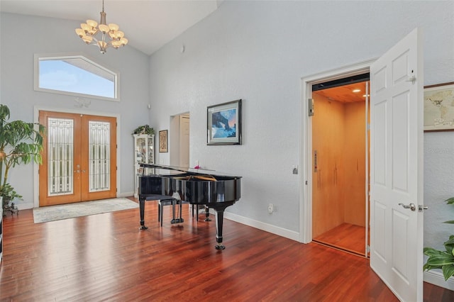 5521 Windward Way, New Port Richey, FL 34652 - entryway with a chandelier, french doors, wood finished floors, and high vaulted ceiling