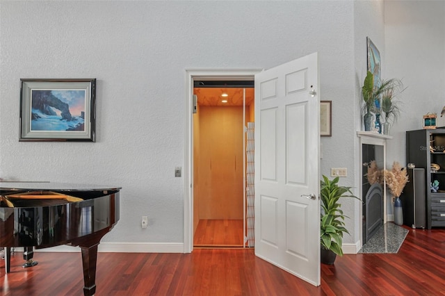 5521 Windward Way, New Port Richey, FL 34652 - foyer featuring wood finished floors and elevator