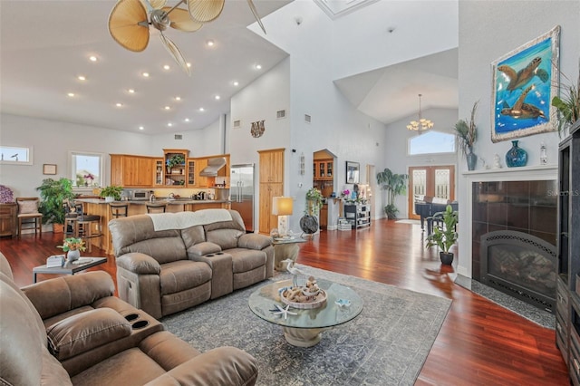 5521 Windward Way, New Port Richey, FL 34652 - living room with high vaulted ceiling, dark wood-type flooring, healthy amount of natural light, ceiling fan, and recessed lighting