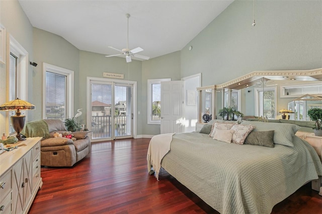 5521 Windward Way, New Port Richey, FL 34652 - bedroom with access to outside, high vaulted ceiling, dark wood-style floors, multiple windows, and ceiling fan