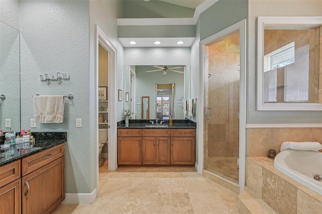 5521 Windward Way, New Port Richey, FL 34652 - full bathroom with vanity, a shower stall, a garden tub, and ceiling fan