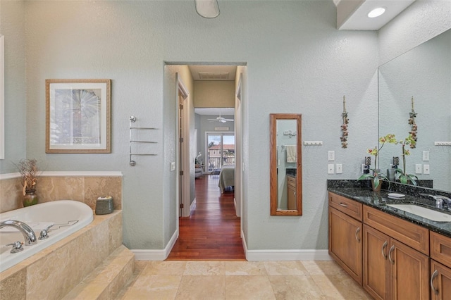 5521 Windward Way, New Port Richey, FL 34652 - ensuite bathroom with a garden tub and double vanity