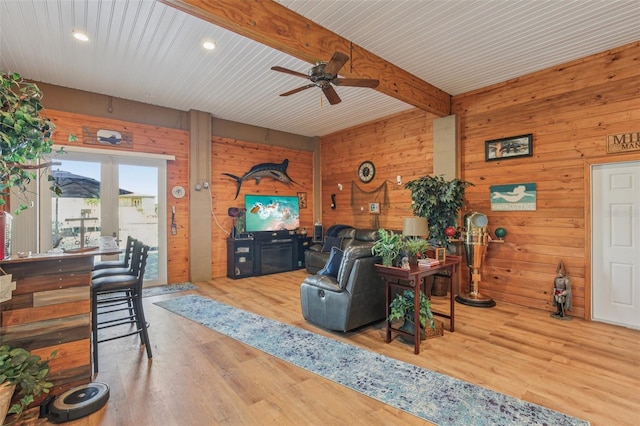 5521 Windward Way, New Port Richey, FL 34652 - living room with ceiling fan, wood walls, recessed lighting, wood finished floors, and beamed ceiling