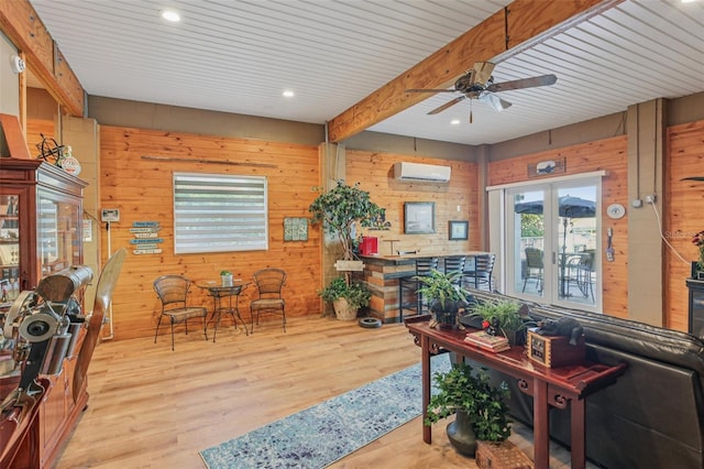 5521 Windward Way, New Port Richey, FL 34652 - living room featuring a ceiling fan, wooden walls, wood finished floors, recessed lighting, and beam ceiling