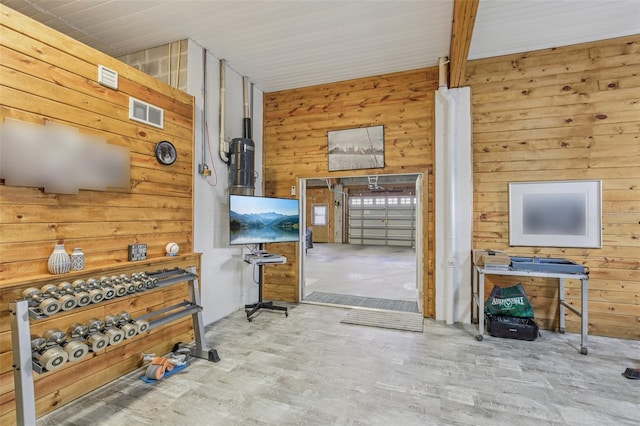 5521 Windward Way, New Port Richey, FL 34652 - miscellaneous room with wood walls and wood finished floors