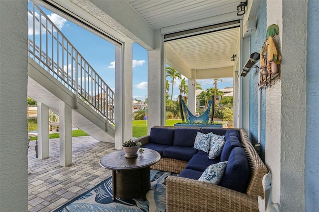 5521 Windward Way, New Port Richey, FL 34652 - view of patio / terrace featuring stairway and an outdoor hangout area