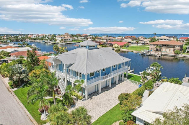 5521 Windward Way, New Port Richey, FL 34652 - aerial perspective of suburban area featuring a large body of water