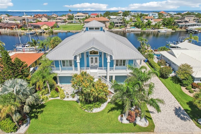 5521 Windward Way, New Port Richey, FL 34652 - aerial perspective of suburban area with a large body of water